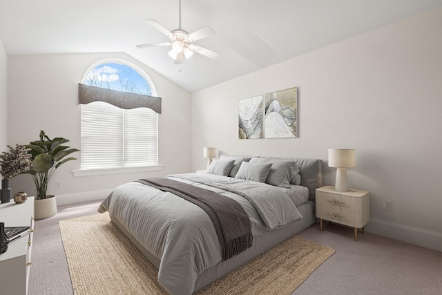5027 Grover Dr, Brighton, MI 48116 - carpeted bedroom with a ceiling fan, baseboards, and lofted ceiling