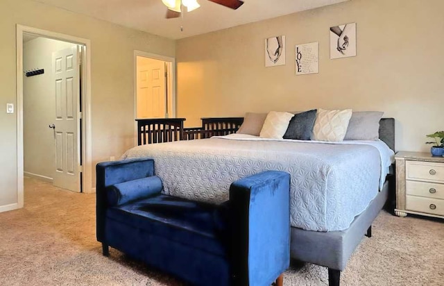 bedroom with carpet floors, a ceiling fan, and baseboards