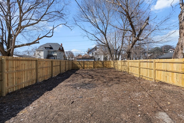 view of yard featuring a fenced backyard