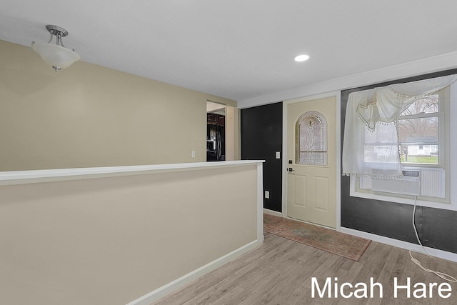 entryway featuring baseboards, cooling unit, recessed lighting, and wood finished floors