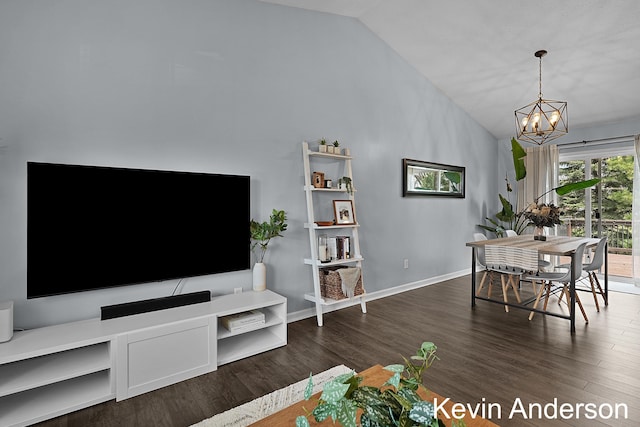 dining room featuring baseboards, high vaulted ceiling, a notable chandelier, and wood finished floors