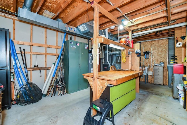 unfinished basement featuring a workshop area