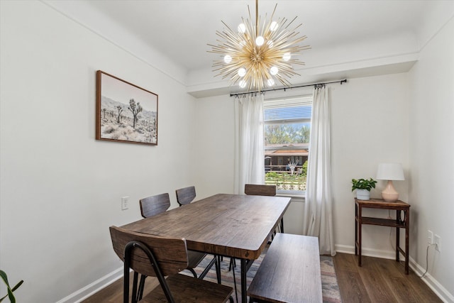 dining room featuring baseboards, a notable chandelier, and dark wood-type flooring