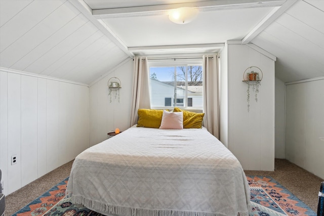 carpeted bedroom featuring vaulted ceiling with beams and wood walls