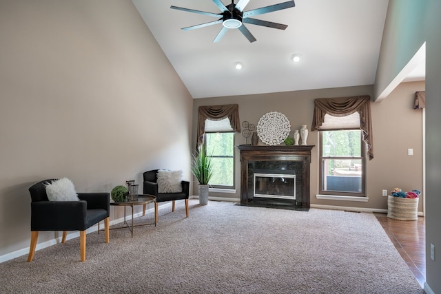 1229 Poppy Hill Dr, Oxford, MI 48371 - living room featuring high vaulted ceiling, baseboards, a fireplace, and a ceiling fan