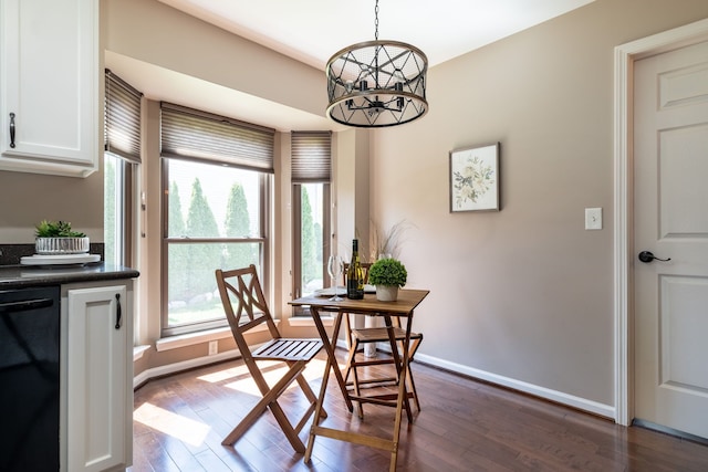 1229 Poppy Hill Dr, Oxford, MI 48371 - dining space featuring baseboards, a chandelier, and dark wood-type flooring