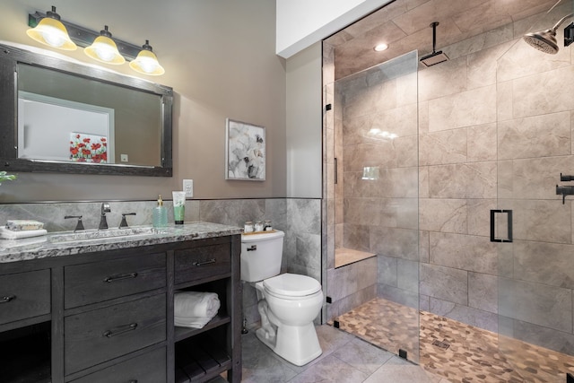 1229 Poppy Hill Dr, Oxford, MI 48371 - bathroom with tile walls, tile patterned flooring, a shower stall, vanity, and toilet