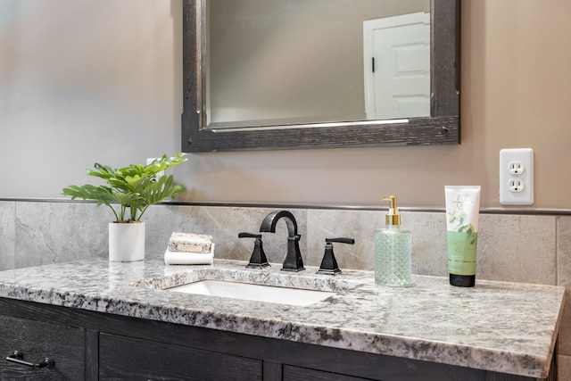 1229 Poppy Hill Dr, Oxford, MI 48371 - bathroom featuring vanity and backsplash