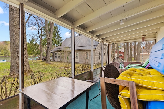 sunroom / solarium with beamed ceiling