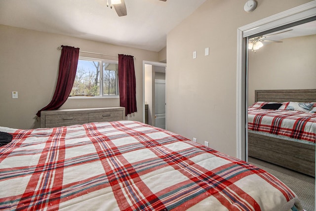 bedroom featuring carpet floors, a ceiling fan, and a closet