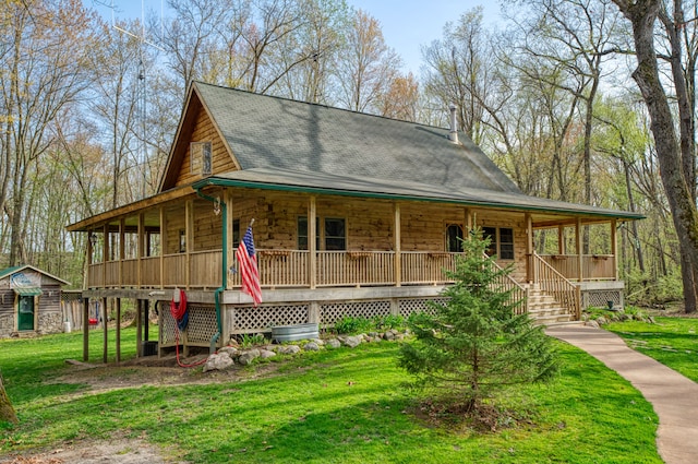 7989 Lovejoy Rd, Byron, MI 48418 - country-style home with roof with shingles, covered porch, an outbuilding, and a front yard