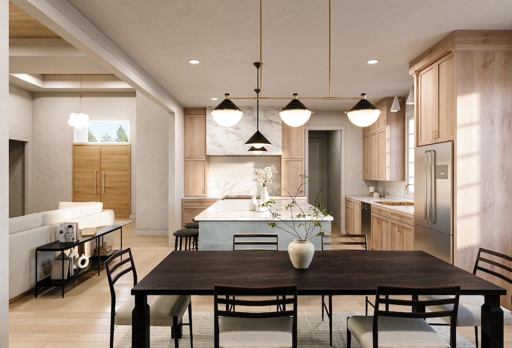 dining area with recessed lighting, baseboards, and light wood-type flooring