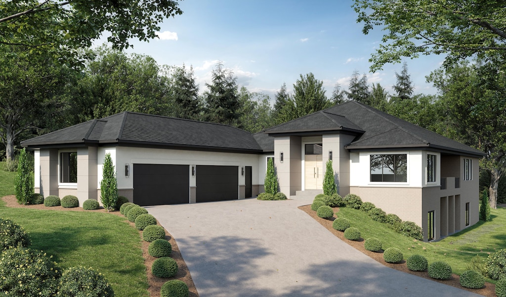 view of front of home with a garage, roof with shingles, a front yard, and concrete driveway