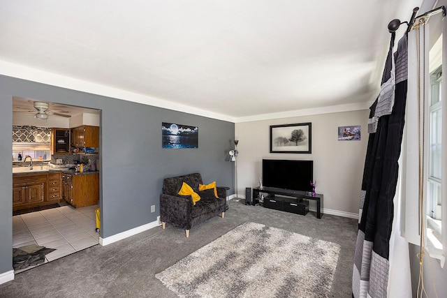 18643 Bittersweet, Fraser, MI 48026 - living room with light colored carpet, baseboards, and ceiling fan