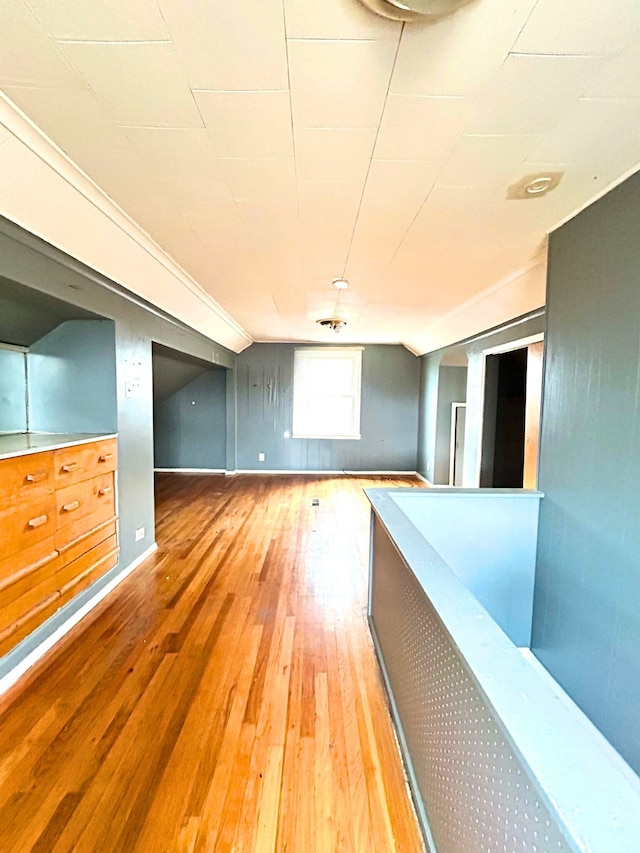 unfurnished room with hardwood / wood-style floors