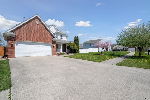 61 Old Carriage Ln, Lapeer, MI 48446 - traditional home featuring fence, driveway, and brick siding