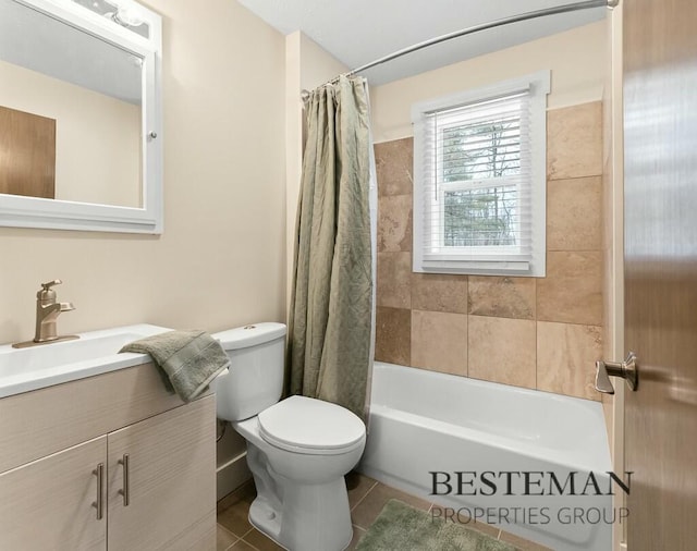 bathroom with vanity, tile patterned floors, toilet, and shower / tub combo