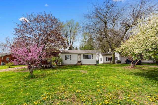 659 N Van Dyke Rd, Imlay City, MI 48444 - ranch-style house with entry steps and a front lawn