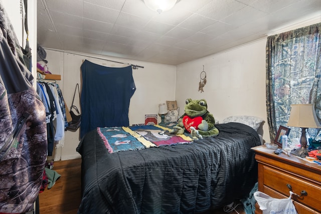659 N Van Dyke Rd, Imlay City, MI 48444 - bedroom featuring wood finished floors and ornamental molding