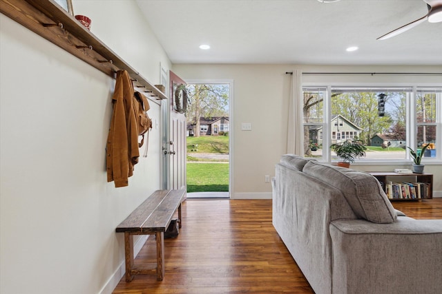 mudroom featuring recessed lighting, baseboards, and wood finished floors