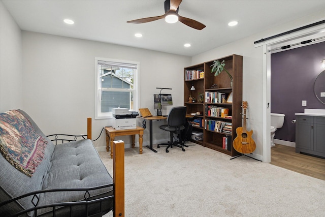 office featuring recessed lighting, ceiling fan, baseboards, and carpet