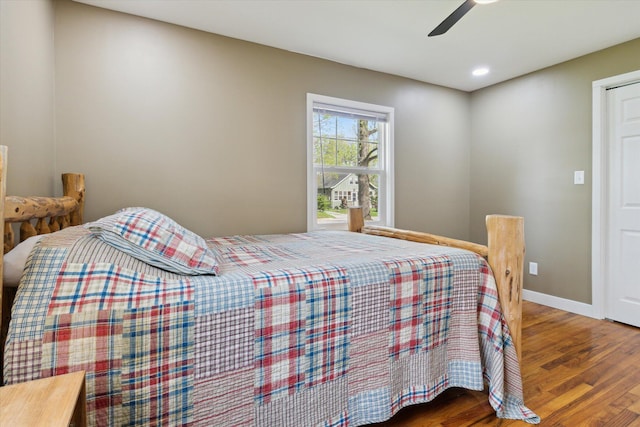 bedroom with baseboards, ceiling fan, recessed lighting, and wood finished floors