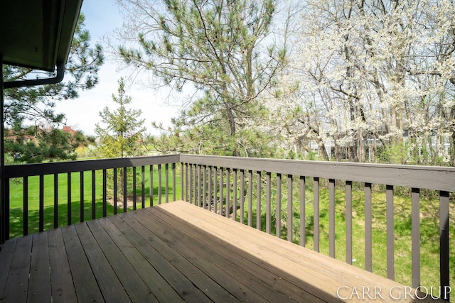 deck featuring a lawn