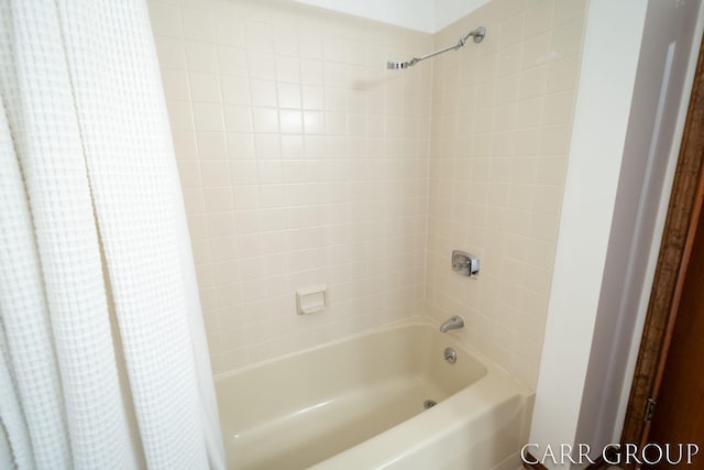 full bath featuring shower / tub combo with curtain