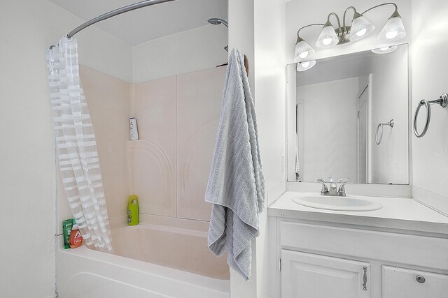 bathroom with vanity and shower / bath combination with curtain