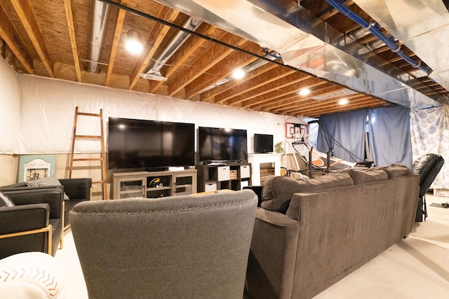 living area with concrete flooring