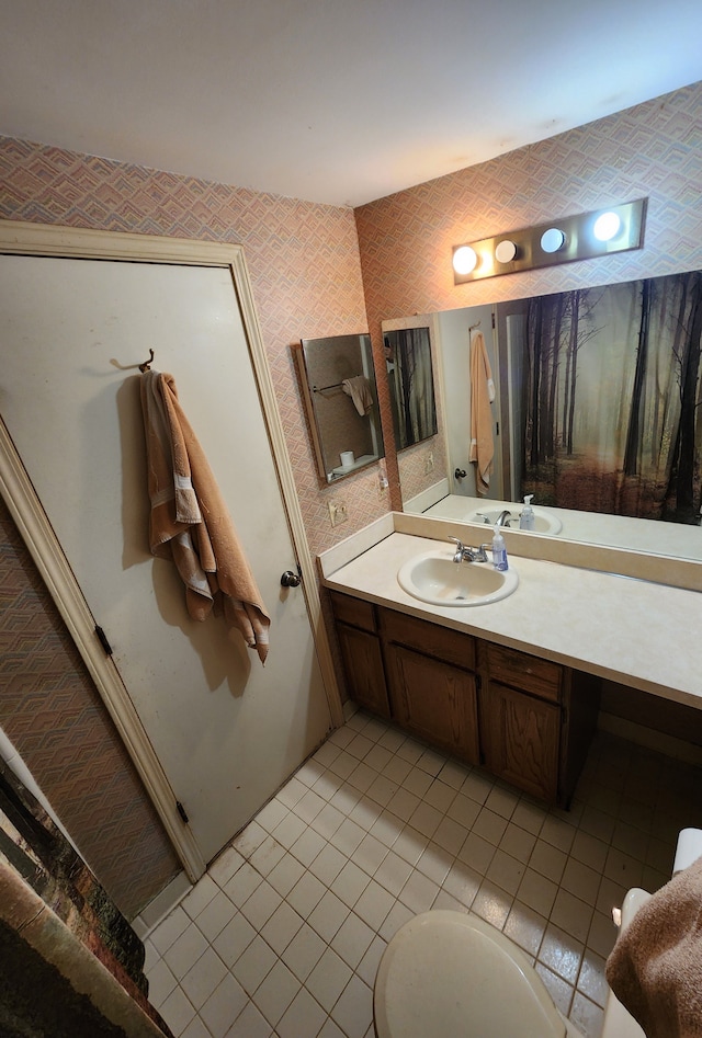 bathroom with vanity and tile patterned floors
