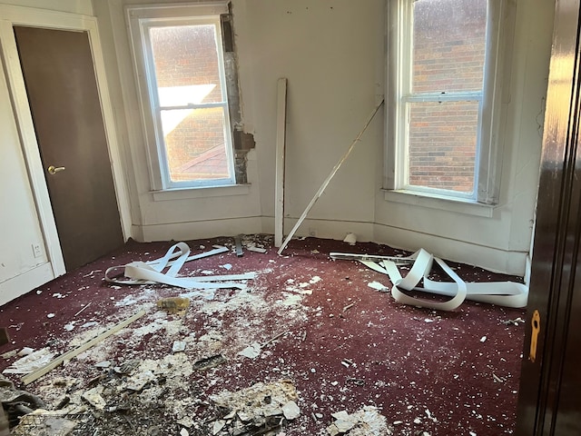 130 Gladstone St, Detroit, MI 48202 - carpeted empty room featuring plenty of natural light