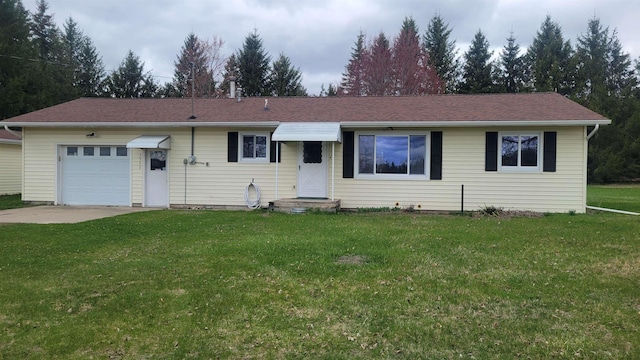 ranch-style home with driveway and a front lawn