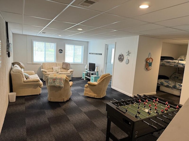 recreation room with a paneled ceiling, visible vents, baseboards, recessed lighting, and dark carpet
