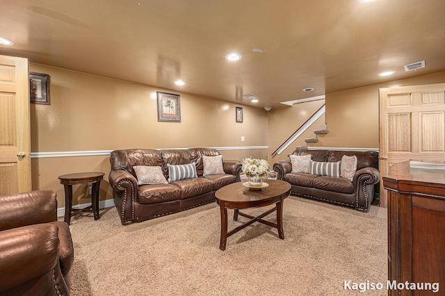 living room featuring stairs, recessed lighting, visible vents, and carpet