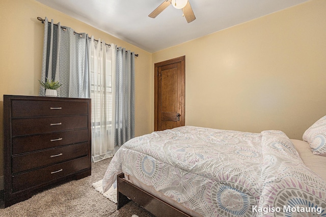bedroom with carpet flooring and a ceiling fan