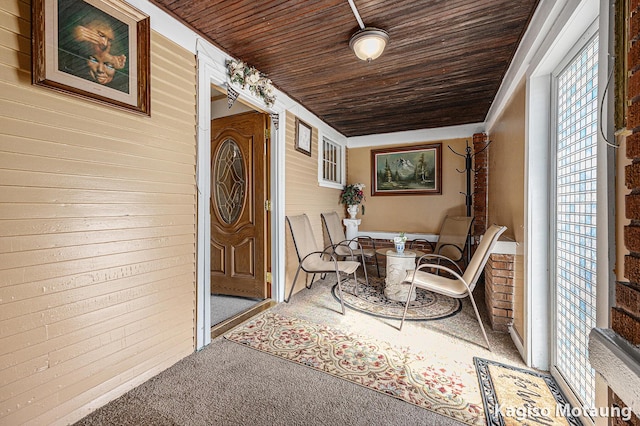 property entrance featuring a porch