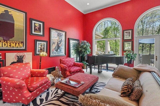 1293 Huntcliff, Milford, MI 48380 - living area with a towering ceiling and carpet floors