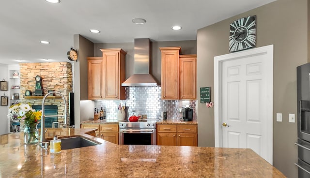1293 Huntcliff, Milford, MI 48380 - kitchen featuring wall chimney range hood, stainless steel electric range oven, light stone counters, tasteful backsplash, and a sink