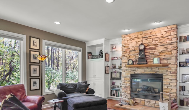 1293 Huntcliff, Milford, MI 48380 - living area with a fireplace, wood finished floors, recessed lighting, and ornamental molding
