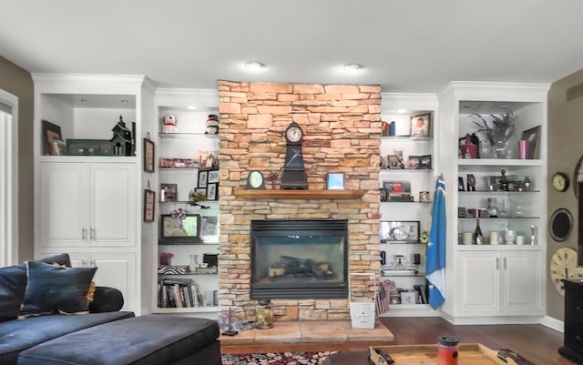 1293 Huntcliff, Milford, MI 48380 - living room featuring wood finished floors and a fireplace