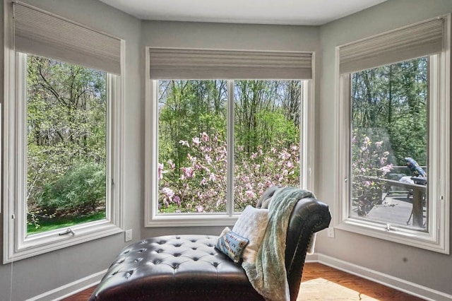 1293 Huntcliff, Milford, MI 48380 - sitting room with baseboards and wood finished floors