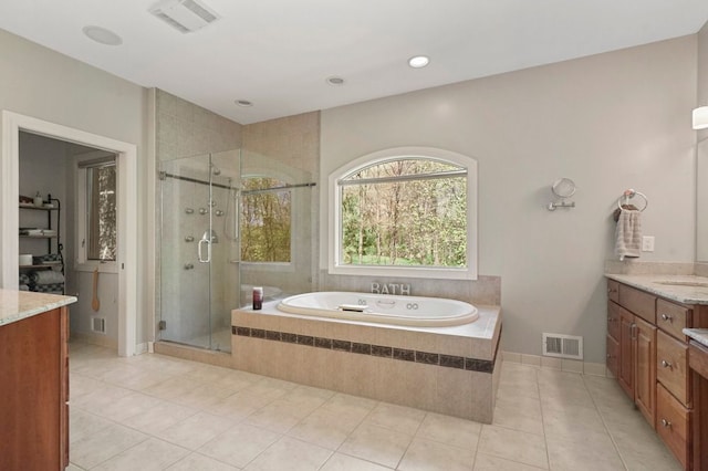1293 Huntcliff, Milford, MI 48380 - full bath featuring vanity, a garden tub, tile patterned floors, a stall shower, and recessed lighting