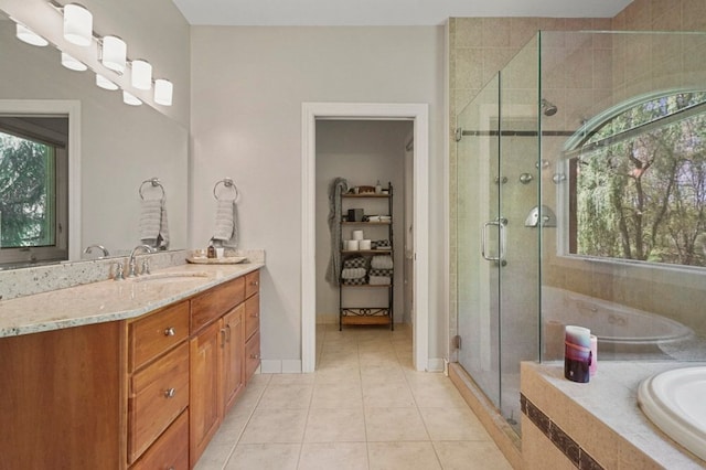 1293 Huntcliff, Milford, MI 48380 - full bath with tile patterned flooring, a shower stall, vanity, and a garden tub