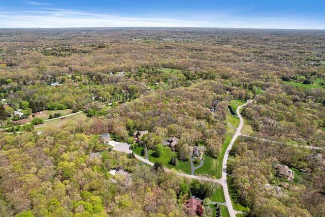 1293 Huntcliff, Milford, MI 48380 - aerial view of property's location featuring a forest