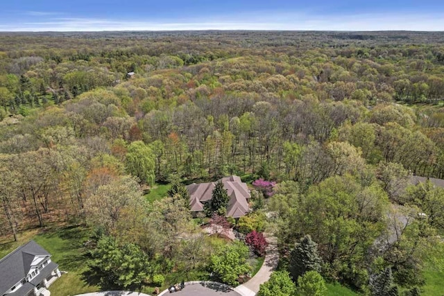 1293 Huntcliff, Milford, MI 48380 - view of property location with a heavily wooded area