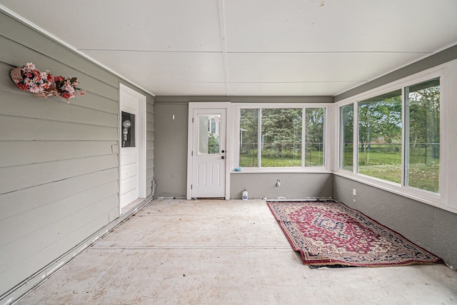 604 E N St, Owosso, MI 48867 - unfurnished sunroom with healthy amount of natural light