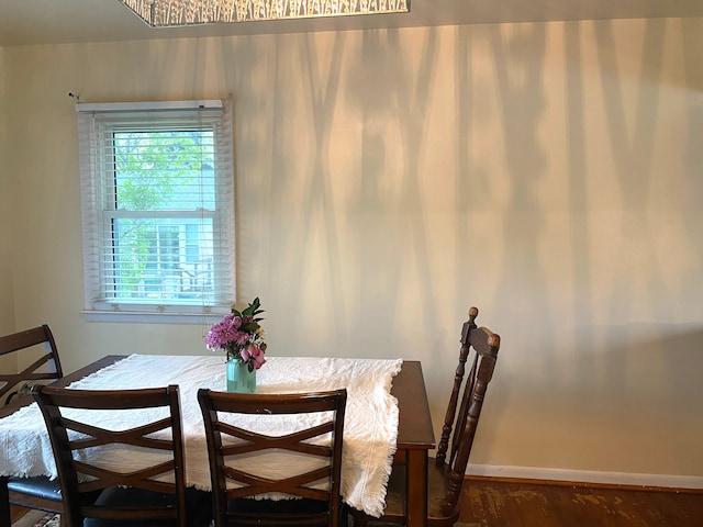 604 E N St, Owosso, MI 48867 - dining area with wood finished floors and baseboards
