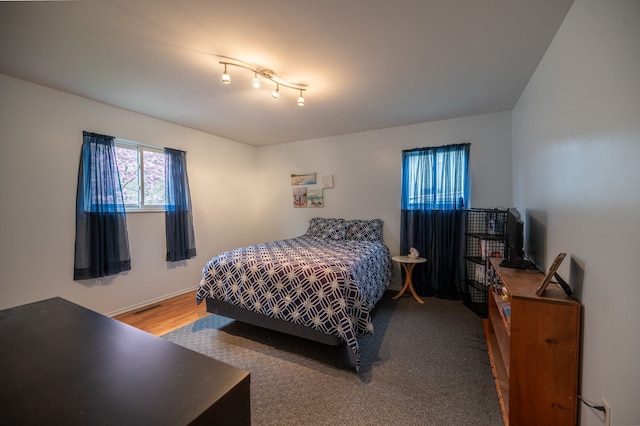 bedroom featuring visible vents