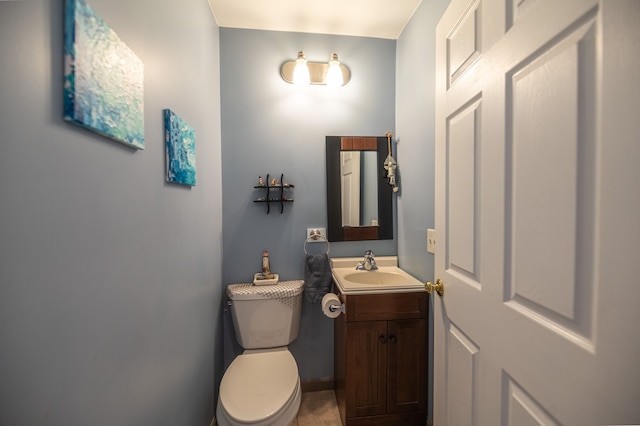 half bath with toilet and vanity